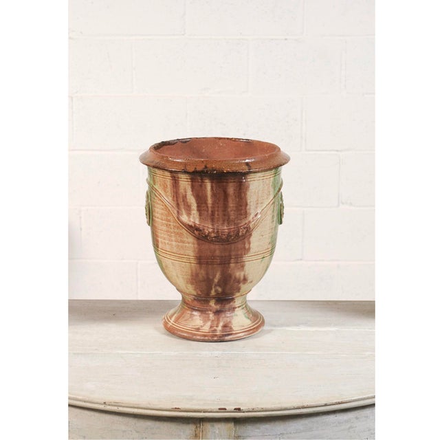 Bring timeless Provençal charm to your home or garden with this vintage French Anduze jar, a classic form celebrated for...