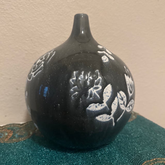 An exceptional mid-century style ceramic vase, featuring an organic, ovoid silhouette with an elongated, slender neck....