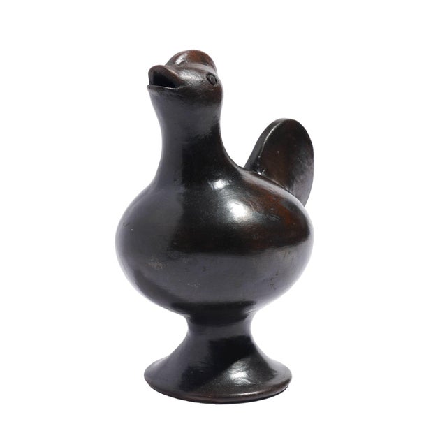 Hand thrown and modeled raku fired terra cotta figure of a rooster, with open beck and a corked opening in the base. East...