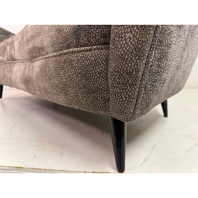 Italian Curved Sofa, 1950s A refined expression of mid-century Italian design, this sculptural two-seat sofa dates to the...