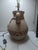 This vintage Southwest Navajo jug design plaster mid-century table lamp from the 1980s exudes a unique charm with its...