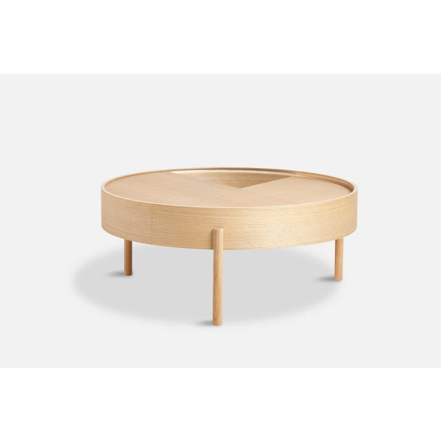 Oiled oak arc coffee table by ditte vad and julie bertrup materials: oak, laminate dimensions: d 89 x w 89 x h 38 cm also...