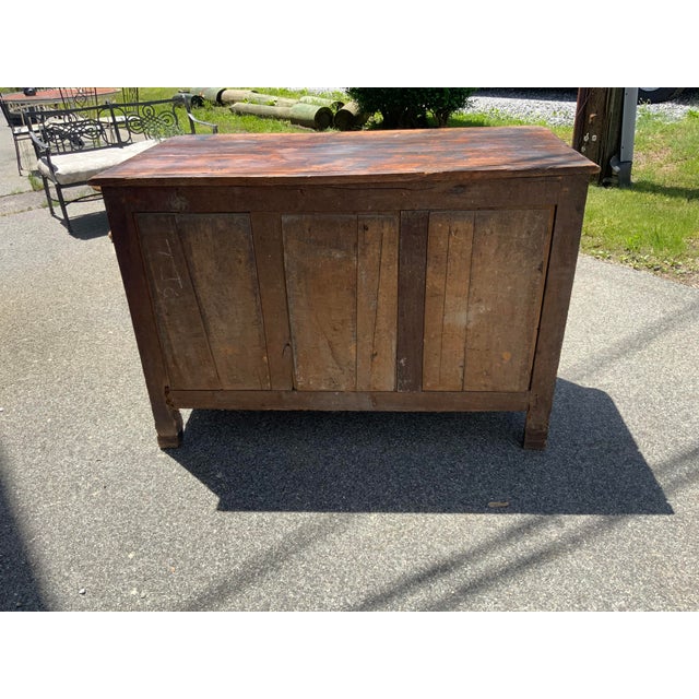 Lous XV buffet French country circa 1800. Walnut and pine, carved two door, short cabriole legs panel doors, two drawers....