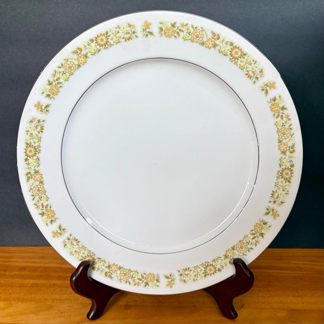 A timeless vintage dinner platter in the classic Towne House “Spring 3094” pattern. Featuring a delicate band of yellow...
