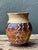 This vintage handcrafted stoneware vase beautifully showcases the artistry of mid-century studio pottery through its...