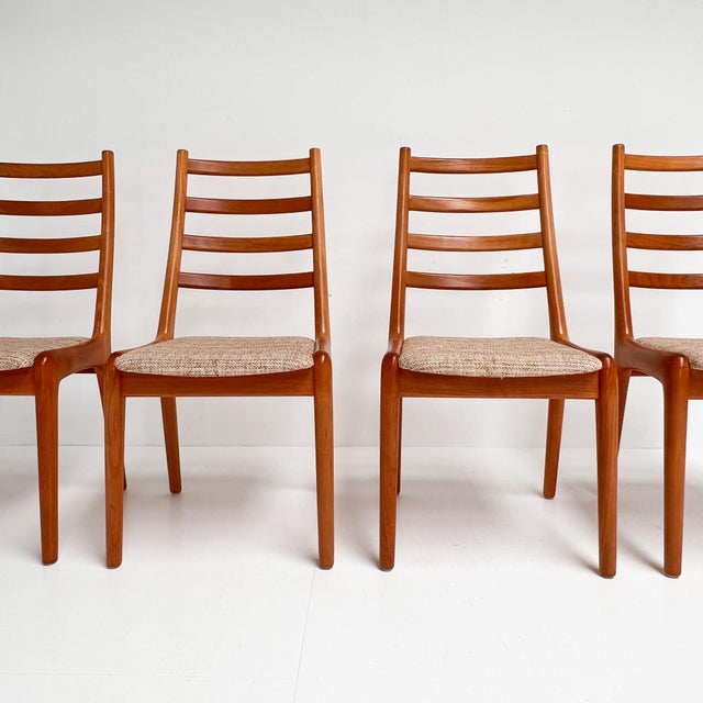 Solid set of 4 beech spindle chairs by JK Mobler. Danish craftsmanship from the 1970s and still popular. The set is in...