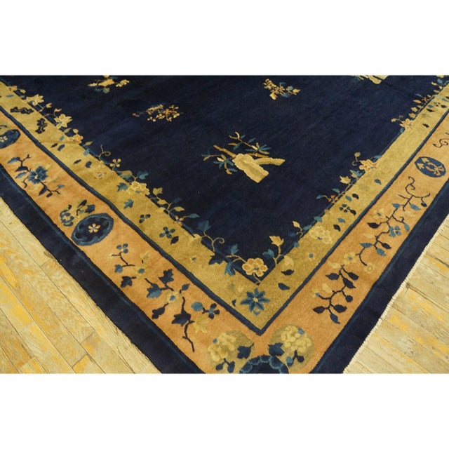 Antique Chinese Floral, Medallion Blue 1920s Rug, Circa Date: 1920s. This exceptional example of early 20th-century...