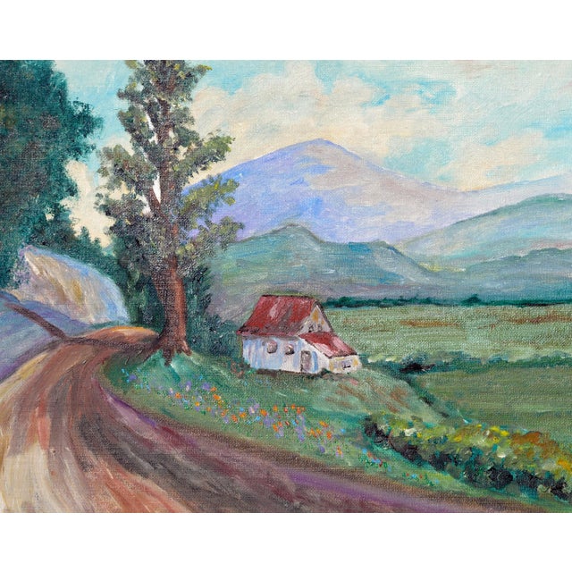 Charming landscape of a house with a red roof on a tree lined country road, surrounded by a beautiful mountain setting...