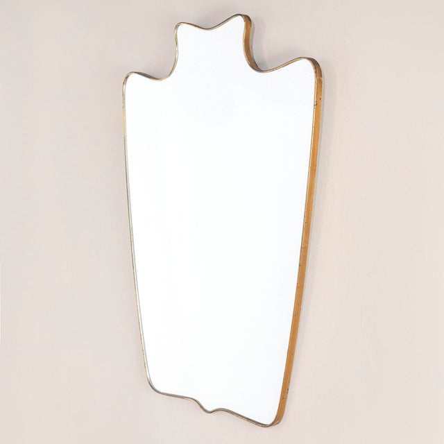 Mirror with Brass Frame attributed to Gio Ponti, 1950, in Good conditions. Designed 1950 to 1959 This piece is attributed...