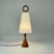 This mid-century table lamp was designed and manufactured in sweden in the 1960s. The light features a sculptural wooden...