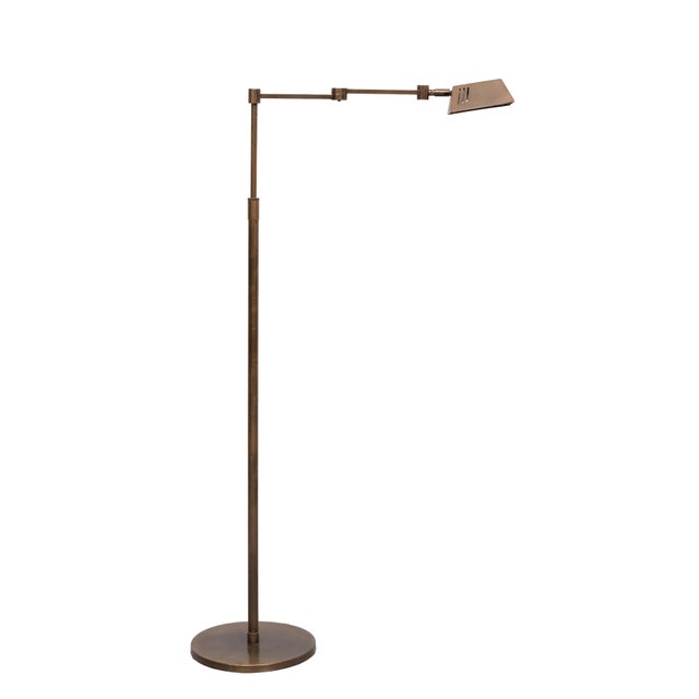 Stunning swing arm floor lamp ,in Bronze. adjustable in Height. Halogen ,comes with a good working dimmer. Very nice...