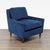 This West Elm lounge chair features a rich blue velvet upholstery and a sleek modern design. With its comfortable...