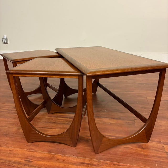 Vintage Astro nesting tables, an interesting design, in which the pair of end tables nest underneath the coffee table,...