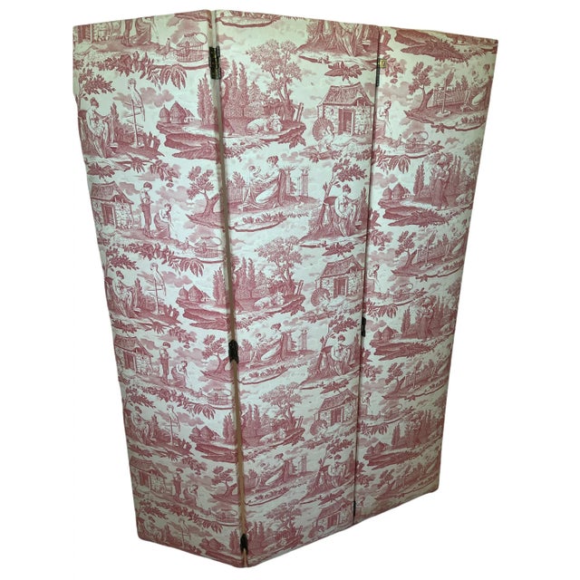 Antique screen upholstered in pink jouy canvas on one side and in the other in plain pink canvas Three panels hinged by...