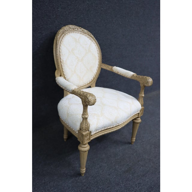 Hancock & Moore Louis XVI style arm chair with cream and white feather/brocade upholstery.