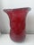Hand-Blown by Creative Artisans this Margie's Garden Red Vase has a rippled edge underneath the rim and dimpled sides for...