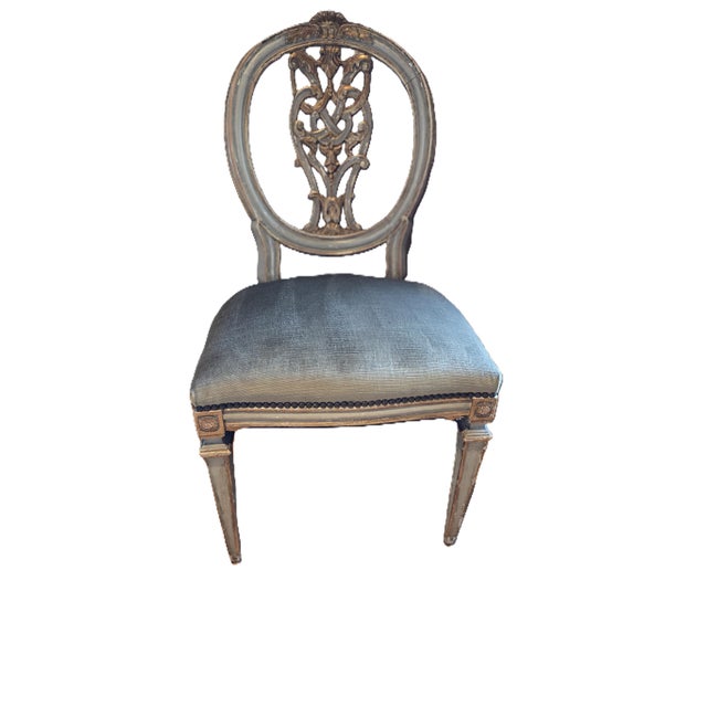 Set of 12 dining chairs purchase in Italy. Painted and gilded and upholstered in olive green velvet.