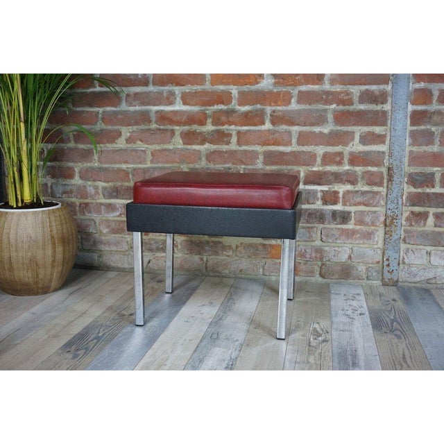 Antique Strafor stool from the 1950s in black and glowing faux leather with chrome legs. All in very good condition.