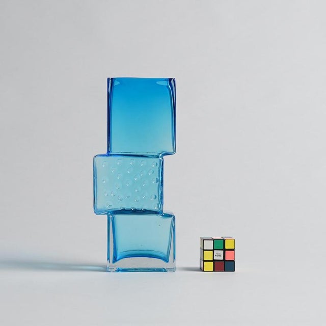 We attribute this sculptural vase to the design of Geoffrey Baxter and manufacturer Whitefriars Glass. Whitefriars Glass...