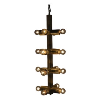 NOIR Axe Chandelier, Metal with Brass Finish For Sale
