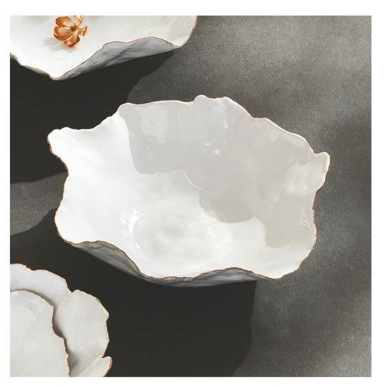 The Maribella Small Bowl Dimensions: 10 x 9.5 x 3.25 With crimped edges and natural form, this decorative tray is a real...