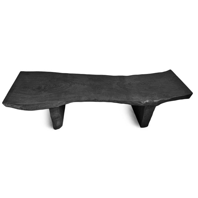Handcrafted from a large live-edge wood slab, this striking bench or coffee table showcases the organic beauty of natural...