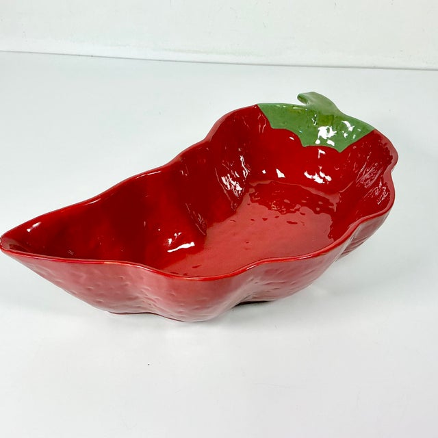 A fun vintage ceramic serving bowl in the Trompe L’Oeil style of a red jalapeño pepper. The bright red and green coloring...