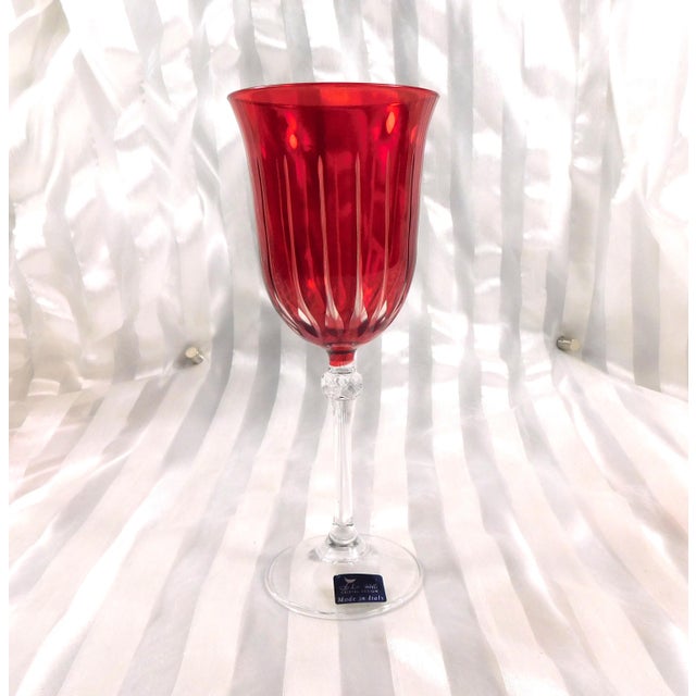This is a set of six Le Sielle (Italy) pink cut to clear water goblets in the Brigitta pattern. Each glass has a pink bowl...