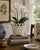 An elegant trompe l'oeil porcelain cachepot crafted in the form of a handwoven rope basket. Executed in glossy white...