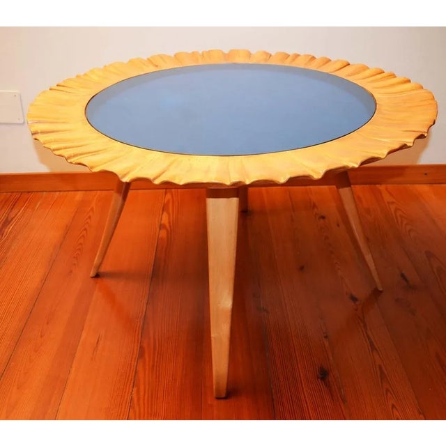 Coffee table in hand carved by hand with blue mirrored glass. Production of the Turin School, Italy 1950s