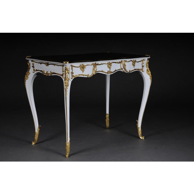 20th century luxurious white bureau plat / writing desk in Louis XV style. Solid beechwood colored in white. Very fine,...