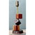 Handcrafted in the mid-20th century, this vintage accent lamp features a whimsical body sculpted from three stacked...