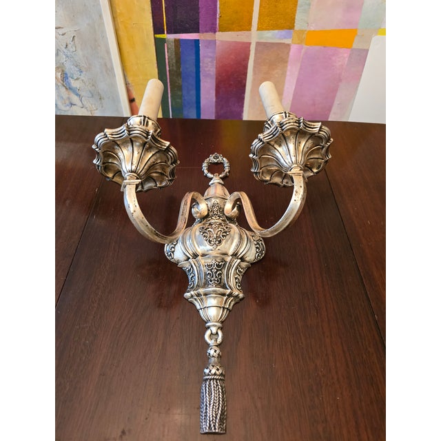 An important double signed antique original e f caldwell & Co silvered bronze sconce. Having double diamond stamped marks...