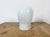 Vintage industrial ceiling or wall light made in former Czechoslivakia during the 1970s. It features a white porcelain...