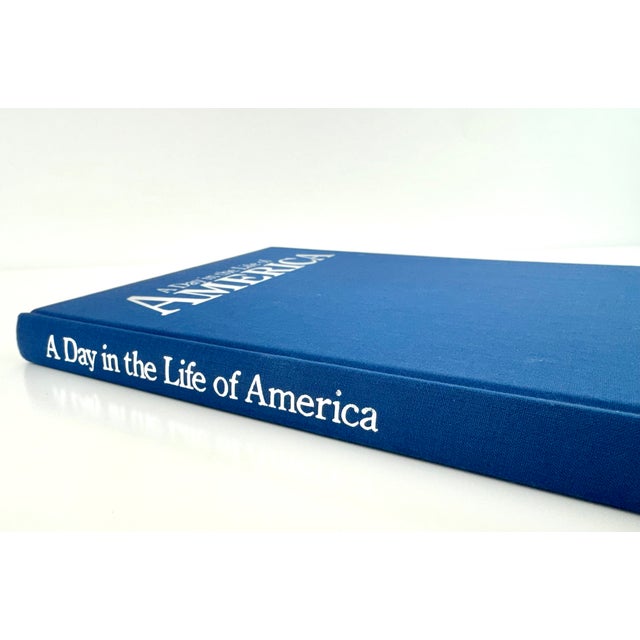 Published in 1986, A Day in the Life of America is the celebrated large-format photographic volume directed by Rick Smolan...