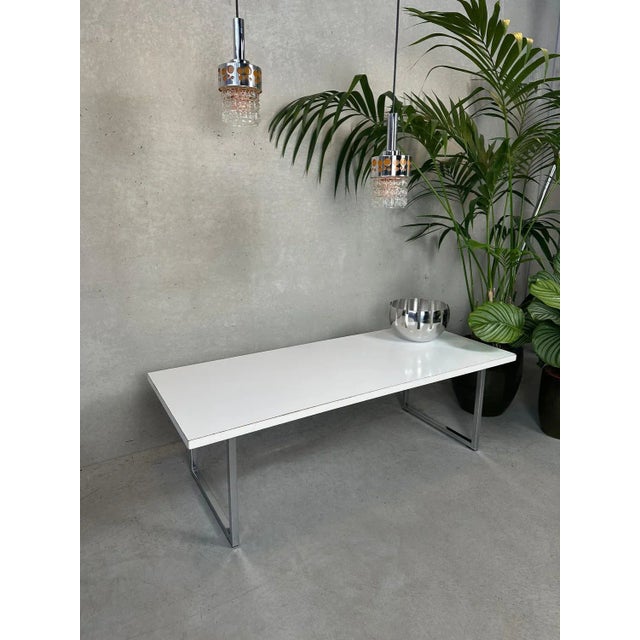 Vintage formica table with chrome bases. Can possibly be used as a bench. Narrow model. Ideal for the not very large...
