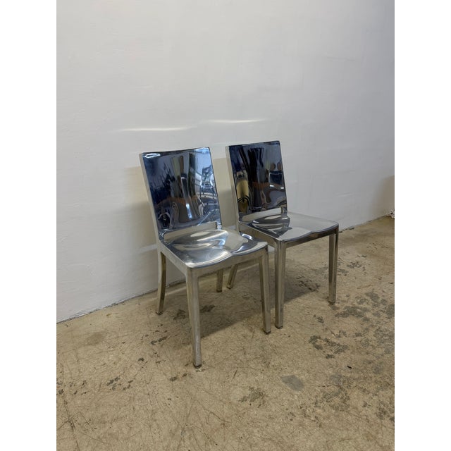 Pair of Philippe Starck Hudson chairs in polished aluminum for Emco. The Hudson chair was designed for the Hudson Hotel in...