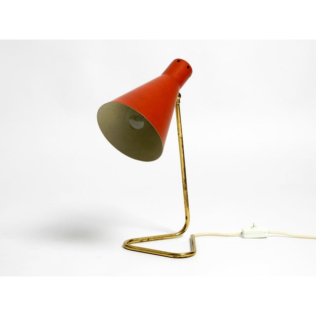 Large beautiful original 1950s table lamp. Probably from an Italian production. Base and neck are made from a bent brass...