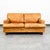 High quality caramel / cognac leather Danish modern 2 seater sofa / Settee by Vatne Mobler, Denmark . This piece was...