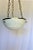 A small size Deco/Modern Chandelier with a solid brass ring applied at the top edge of the Alabaster. Supported by 3...