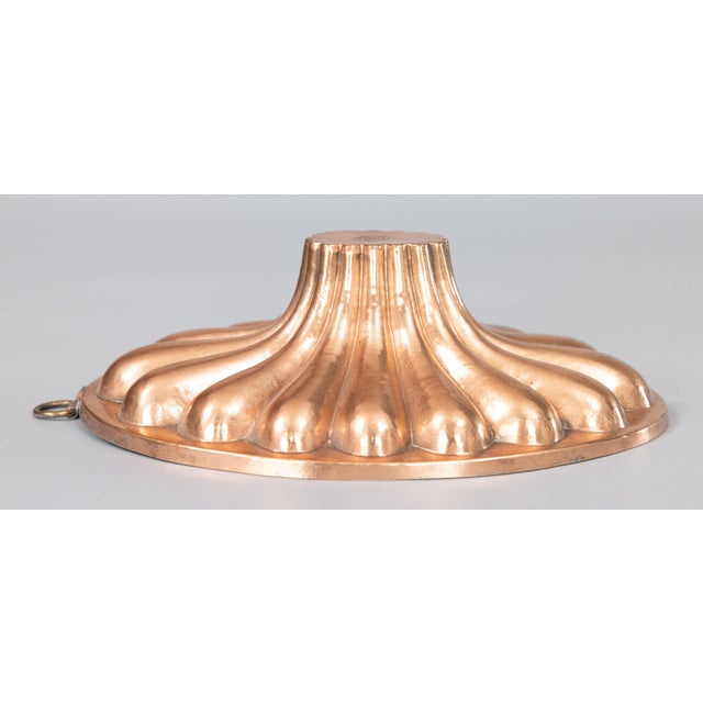 A lovely antique 19th-Century French oval gadrooned copper culinary baking mold with tin lining, signed Trottier Paris,...