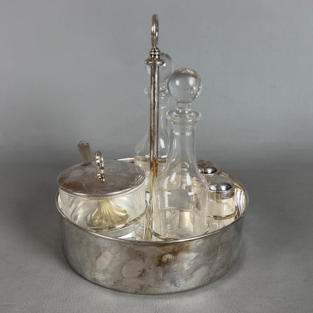 A prestigious and elegant five-piece condiment set, original with calegaro hallmarks in 800 silver and rcr crystal. design...