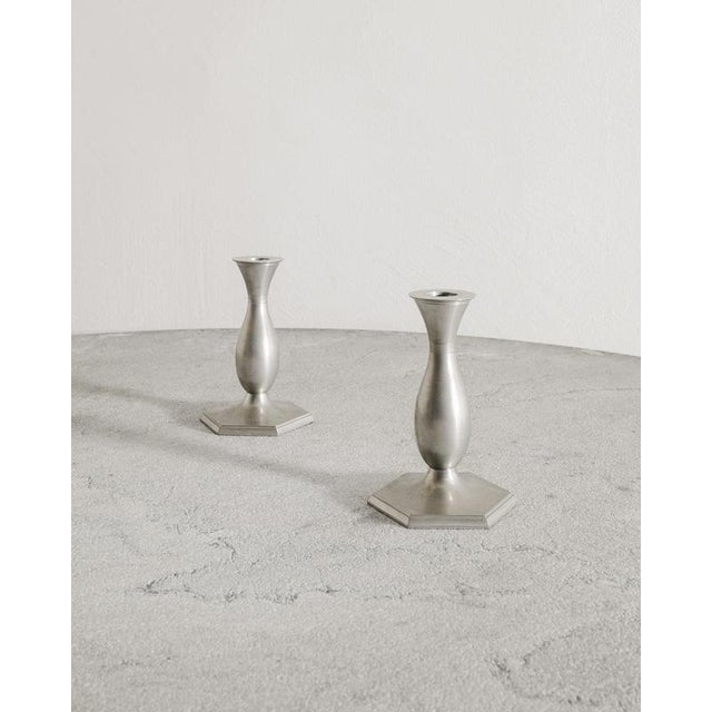 Rare pair of early danish mid century silver candlesticks in patinated pewter by just andersen produced in denmark, 1940s...