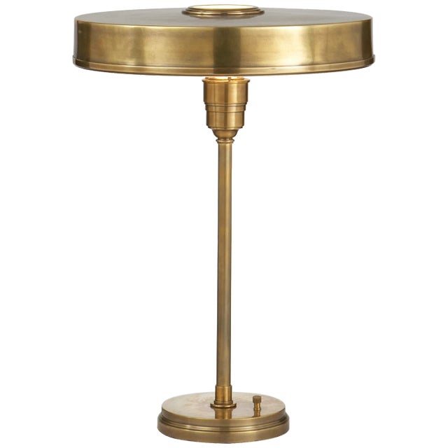 Carlo Table Lamp in Hand-Rubbed Antique Brass Designer: Thomas O'Brien Height: 21" Shade Detail: 3" x 15.5" Base: 6.75"...