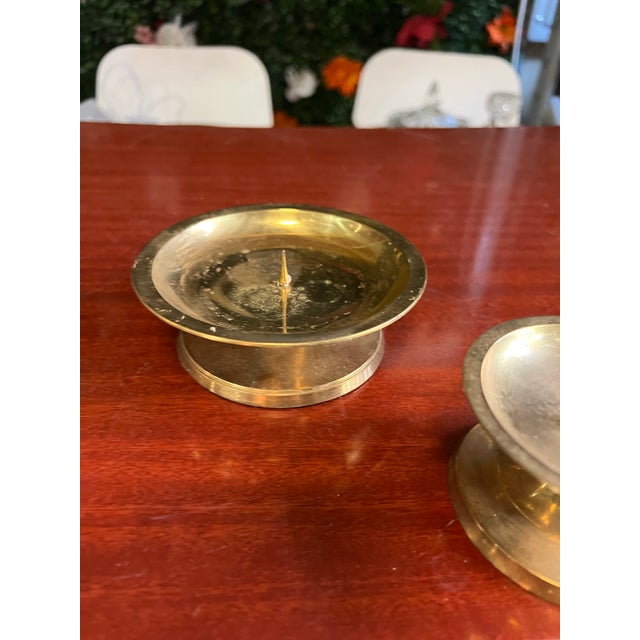 Up for consideration is a beautiful vintage pair of simple brass candle holders. These would look lovely in your home and...