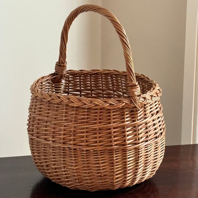 Offering a beautiful handwoven French-style market / gathering basket from the mid-20th century. This lovely basket...