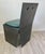 Beautiful from every vantage point, this architectural chair is crafted from heavy solid metal with a bronze finish....