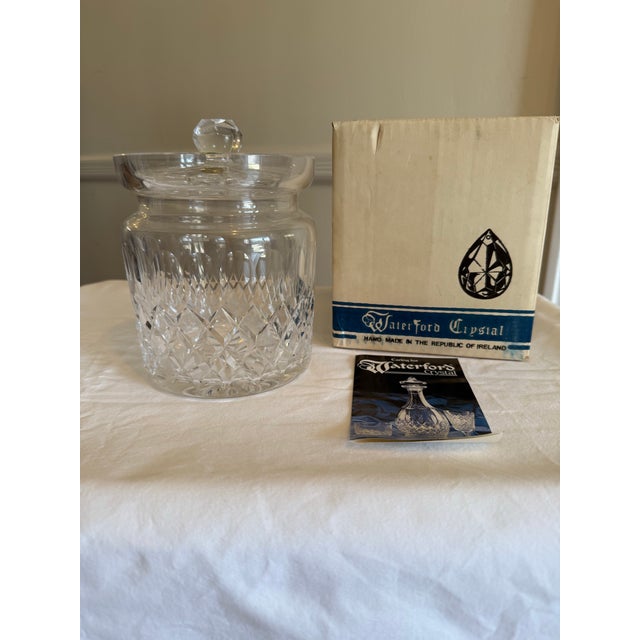 This beautiful Waterford Crystal Colleen Biscuit Barrel is the perfect addition to any kitchen or dining room. Crafted...