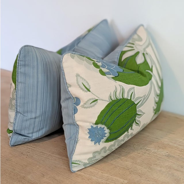 Christopher Farr Cloth Carnival Print linen lumbars in blue and green, with coordinating Schumacher blue striated cotton...
