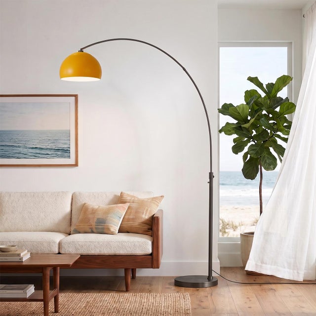 Designed by Peter Morelli in 1960, the Half Dome Arc Lamp is a modern masterpiece featuring a black nickel steel body and...